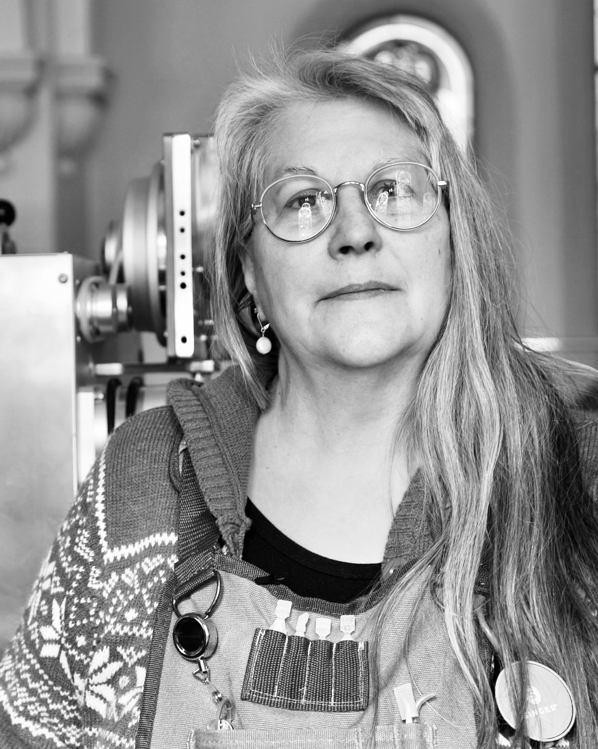 Portrait of Mindy at her sewing machine at Hocking Hills Garment Center